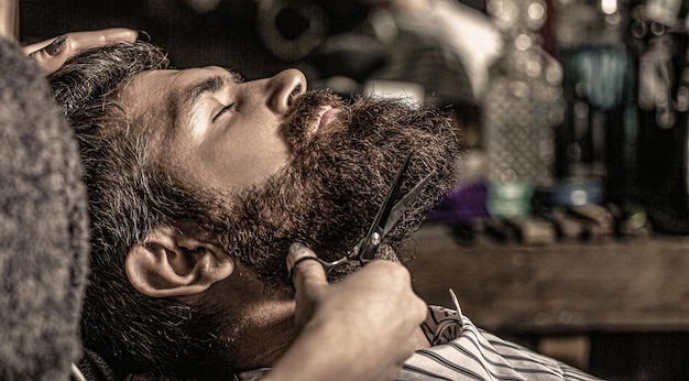 Nożyczki fryzjerskie fryzjer sklep Vintage fryzjer golenie Mężczyzna fryzjerka Broda mężczyzna w zakładzie fryzjerskim