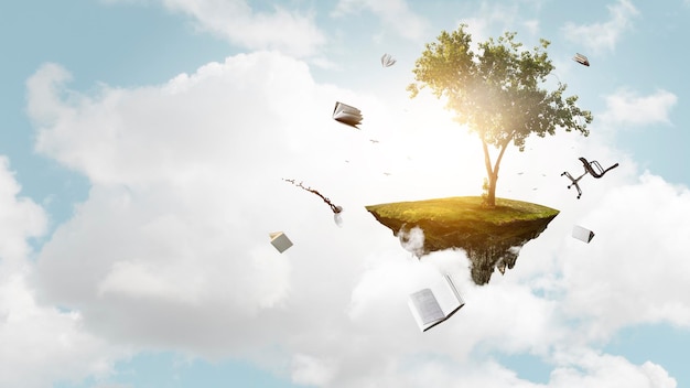 Obraz drzewa i latające książki. Różne środki przekazu