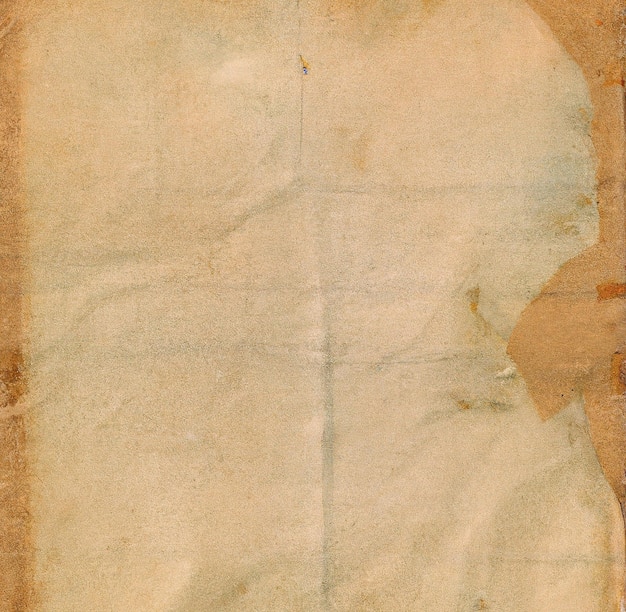 Obraz z bliska poplamionego i pomarszczonego papieru vintage z miejsca na kopię