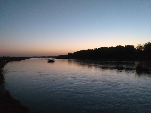 Zdjęcie ocean, woda, morze, lato, słońce, podróże, miłość, wakacje, plaża, natura, zachód i wschód słońca.