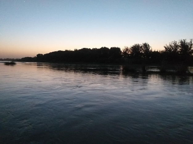 Zdjęcie ocean, woda, morze, lato, słońce, podróże, miłość, wakacje, plaża, natura, zachód i wschód słońca.