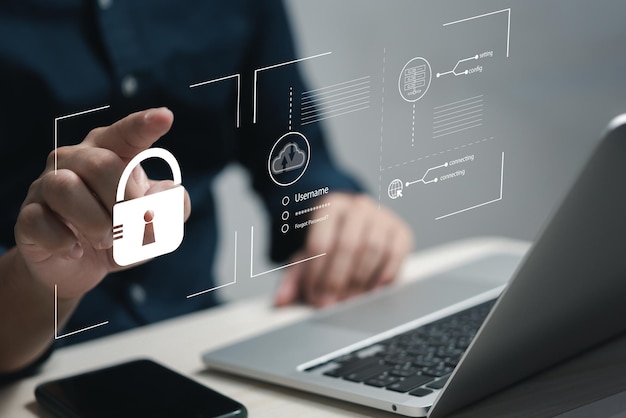 Ochrona danych osobowych przed hakerami Bezpieczeństwo dostępu internetowego do danych osobowych bezpieczeństwo informacji identyfikujących i szyfrowanieczłowiek wpisujący login i hasło na wirtualnym ekranie