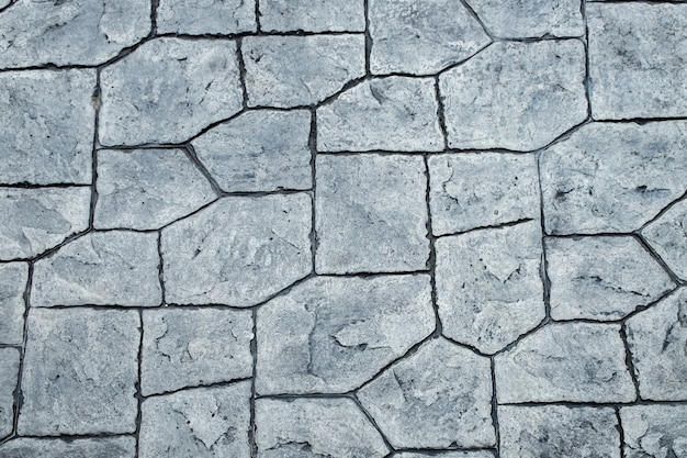 Odgórnego widoku znaczka betonu tekstury tło