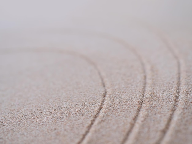 Ogród Zen Spokój Symbole Natura Linia Wzór Tekstura Japonia na tle piaszczystej plaży Projekt Buddyzm Spa MedytacjaPustynia Równowaga AbstrakcjaKoncepcja odnowy biologicznej Duchowość Duch Mandala Relaks