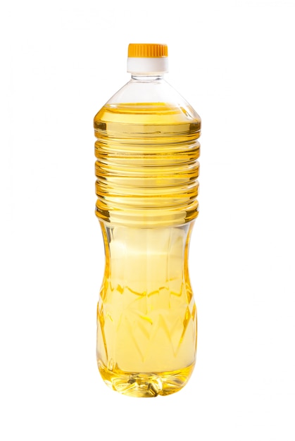 Olej słonecznikowy w przezroczystych butelkach na białym tle