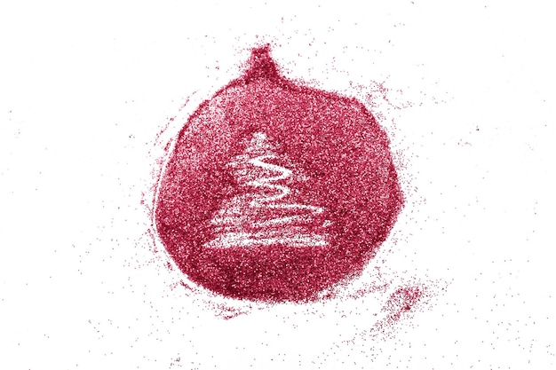 Palcem rysowane drzewo na błyszczącym czerwonym tle konfetti Boże Narodzenie zabawka piłka