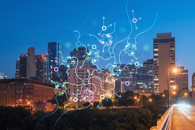 Panoramiczny widok dzielnicy Broadway w Nashville nad rzeką w oświetloną noc Tennessee USA Hologram koncepcji sztucznej inteligencji AI biznesowe uczenie maszynowe sieć neuronowa robotyka
