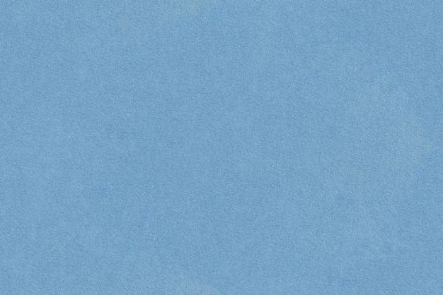 Zdjęcie papier pastelowo-niebieski z teksturą o drobnej strukturze, bezszwowy, płytowy, szerokość obrazu tła 20 cm
