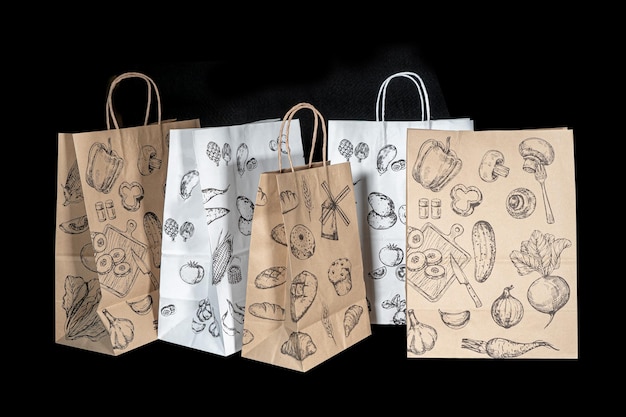 Papierowa torba nadająca się do recyklingu na zakupy prezentów i jedzenie na wynos makieta na czarnym tle Przyjazna dla środowiska niż jednorazowe plastikowe torby