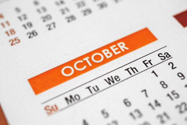 Październikowy kalendarz tło, zbliżenie zdjęcia