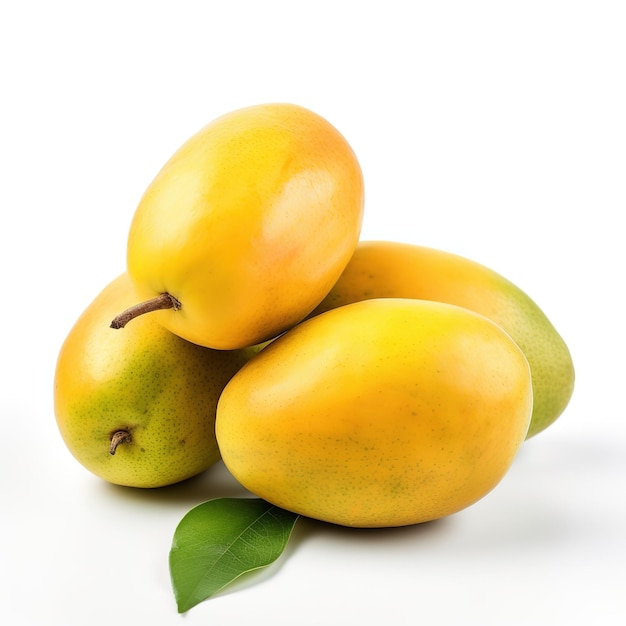 Pęczek mango z zielonym liściem na wierzchu.