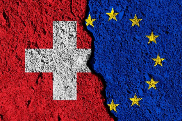 Pęknięcie między koncepcją stosunków politycznych flagi Unii Europejskiej i Szwajcarii