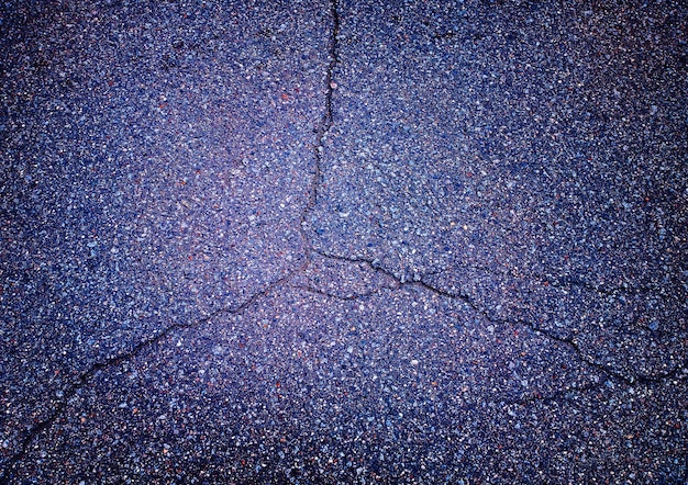 Zdjęcie pęknięty asfalt na ulicy tekstury tła