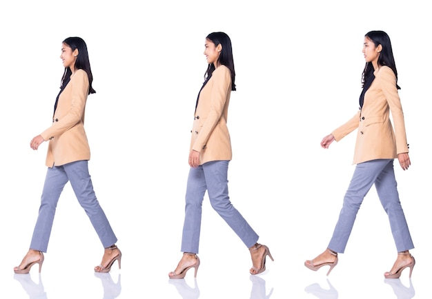 Zdjęcie pełna długość snap figure 20s 30s asian business woman stoją w kremie formalne właściwe spodnie garniturowe i buty na wysokim obcasie, oświetlenie studyjne na białym tle na białym tle, kolaż grupowy spacery w wielu pozach