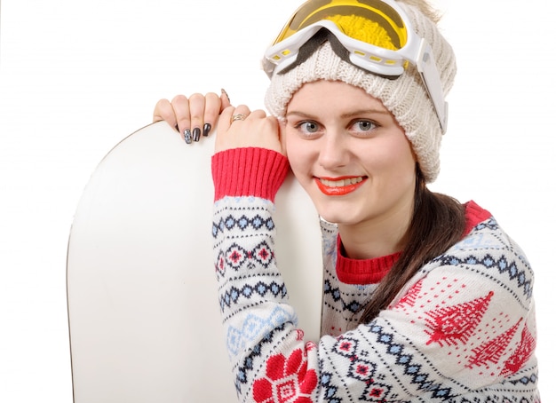 Zdjęcie piękna kobieta z snowboardem