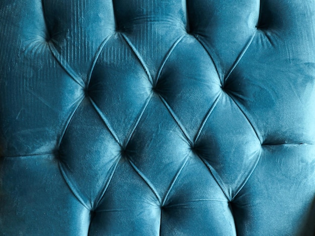 Piękna niebieskozielona aksamitna powierzchnia mebli
