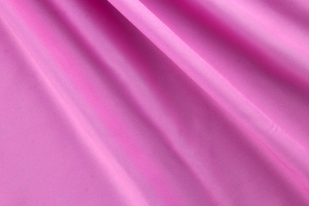 Piękna różowa tkanina i bawełniana tkanina tło tekstylne faliste różowe bawełniane gładkie premium różowe