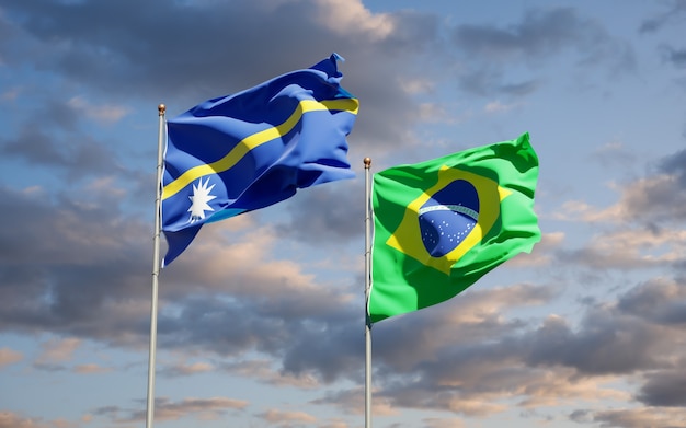 Piękne flagi państwowe Nauru i Brazylii razem na błękitne niebo