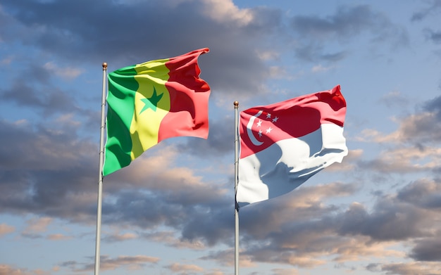 Piękne narodowe flagi państwowe Senegalu i Singapuru razem