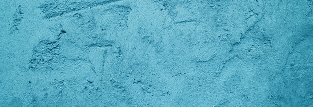 Piękne niebieskie tło stara tekstura ściany niebieskie tło otynkowane jasnoniebieskie betonowe ściany