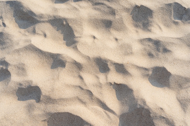 Piękne tło piasek i teksturowane na tropikalnej plaży