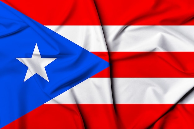 Pięknie machająca i paskowa tekstura tła flagi Puerto Rico z żywymi kolorami