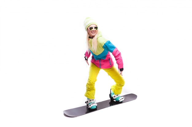 Piękno Młoda Kobieta W Kombinezonie Narciarskim I Okularach Przeciwsłonecznych Jedzie Snowboard