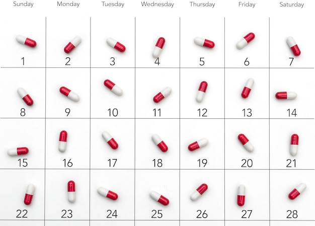 Pigułki na każdy dzień kalendarza Regulatory taking medicament