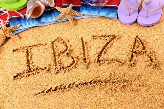 Zdjęcie pisanie na plaży ibiza