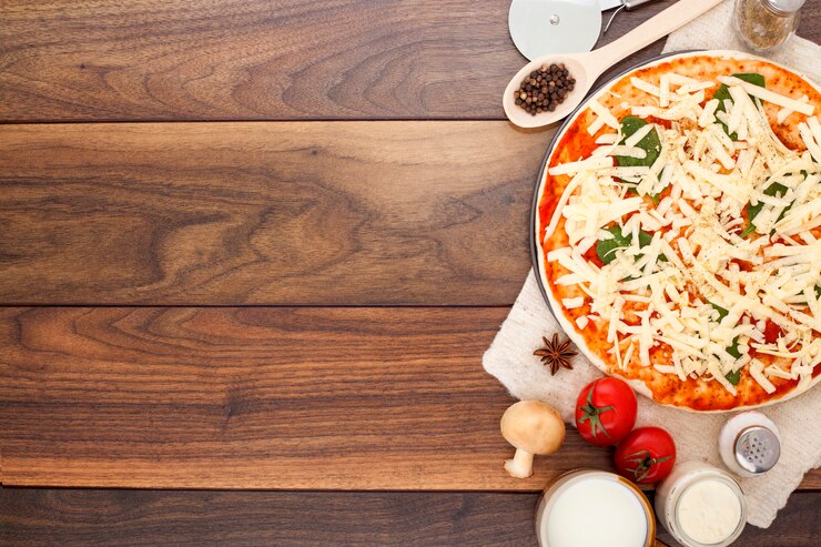 Zdjęcie pizza na drewnianym tle
