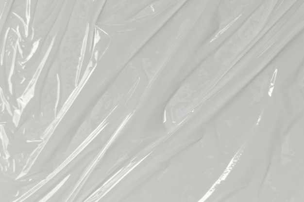 Plastikowa przezroczysta torba celofanowa na białym tle Biały film plastikowy tło tekstura Biała torba plastikowa tekstura