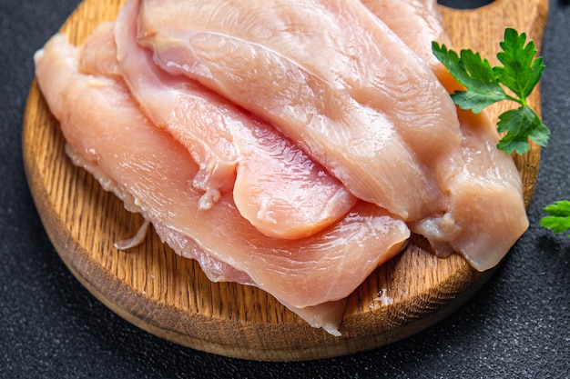 Plastry piersi kurczaka świeże mięso drób zdrowy posiłek jedzenie przekąska na stole kopia przestrzeń jedzenie