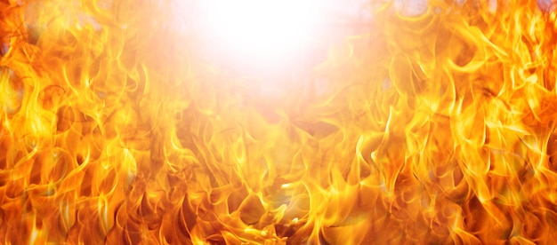 Płomień ognia ze światłem słonecznym wewnątrz Abstrakcyjna tekstura płomienia ognia na baner i teksturę