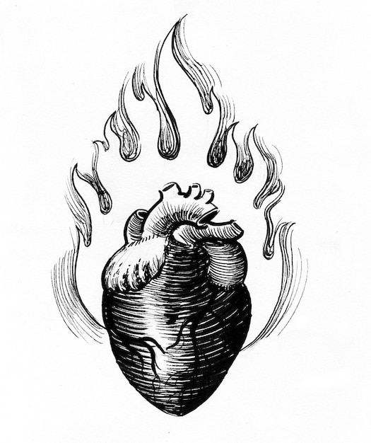 Zdjęcie płonące serce. czarno-biały rysunek tuszem