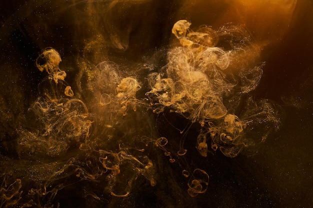 Płynna płynna sztuka abstrakcyjne tło Ochry i pierścienie dymu tańczą farby akrylowe podwodna przestrzeń eksplozja koloru oceanu