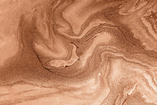 Zdjęcie płynna tekstura błyszczącego lakieru do paznokciabstrakcyjne tło w kolorze brzoskwiniowym