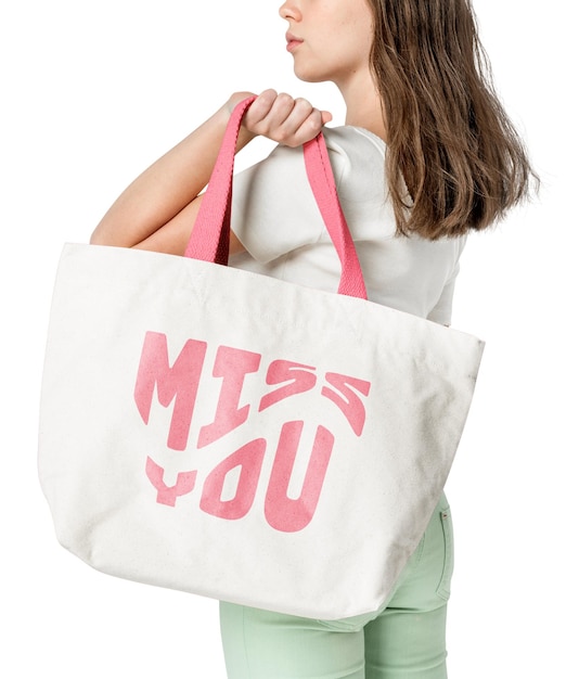 Png beżowy model torebki z różową typografią MISS YOU