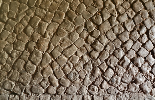 Zdjęcie podłoga z kamienia brukowanego tekstura tła brukowany widok na górę starego kamiennego chodnika