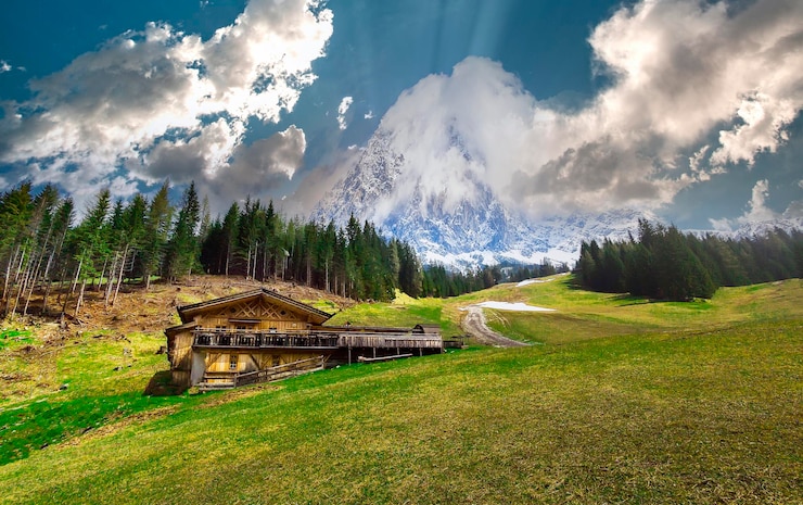 Zdjęcie podróżnik z widokiem na jezioro seebensee z zugspitze i sonnenspitze góry wetterstein alpy tyrol