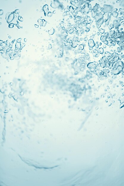 Zdjęcie podwodne pęcherzyki powietrza tekstury jasnoniebieskie tło