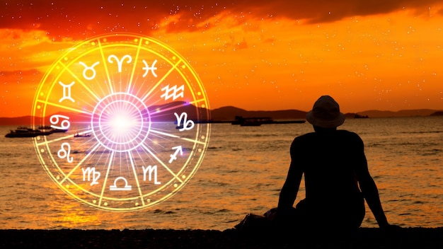 Pojęcie astrologii i horoskopu osoba wewnątrz koła znaku zodiaku znaki zodiaku w obrębie kręgu horoskopu astrologia wiedza o gwiazdach na niebie potęga wszechświata pojęcie