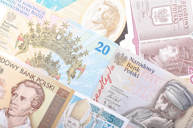 Zdjęcie polski złoty, tło biznesowe z banknotami