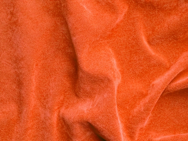 Pomarańczowa aksamitna tekstura tkaniny używana jako tło Puste pomarańczowe tło tkaniny z miękkiego i gładkiego materiału tekstylnego Jest miejsce na textx9