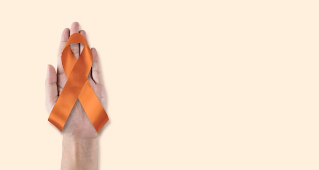 Pomarańczowa wstążka na miesiąc świadomości raka nerki białaczka stwardnienie rozsiane toczeń choroba ADHD