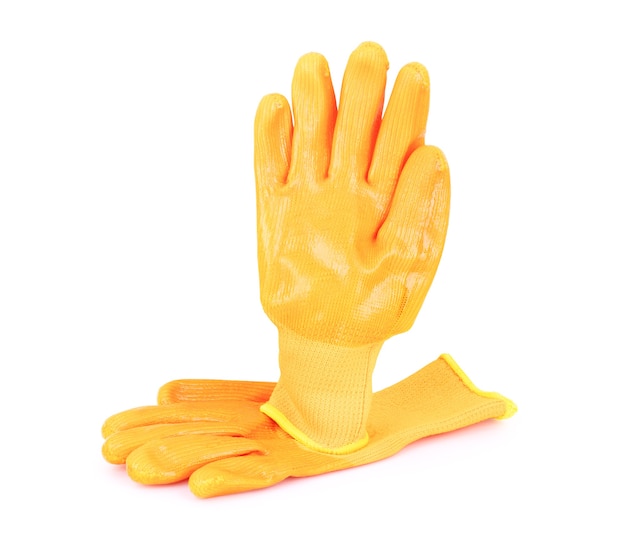 Pomarańczowe rękawiczki na białym tle