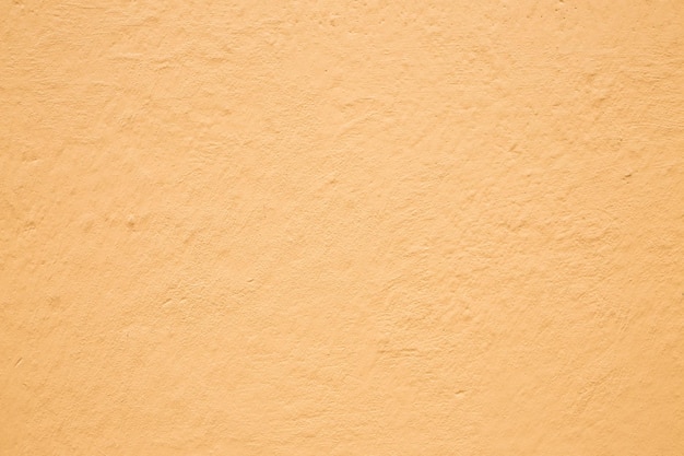 Pomarańczowe tło betonowej ściany Kopiuj przestrzeń