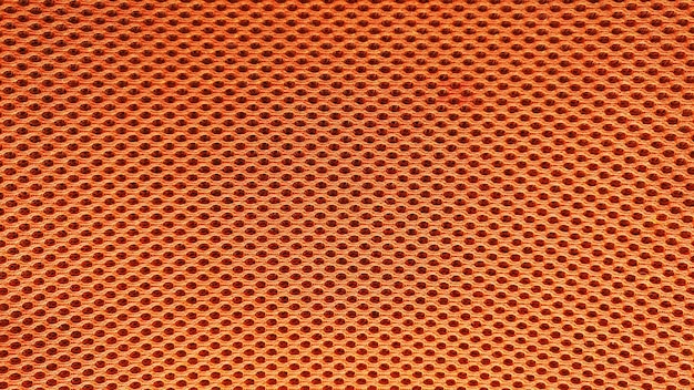 Zdjęcie pomarańczowe tło wzór tkaniny nylonowej