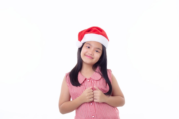 Portret małej azjatyckiej dziewczyny w kapeluszu Santa