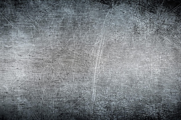 Zdjęcie porysowany brudny zakurzony płytka miedziana tekstura starej metalowej tła chmurny i drapawy mosiądz czarno-biały obraz.