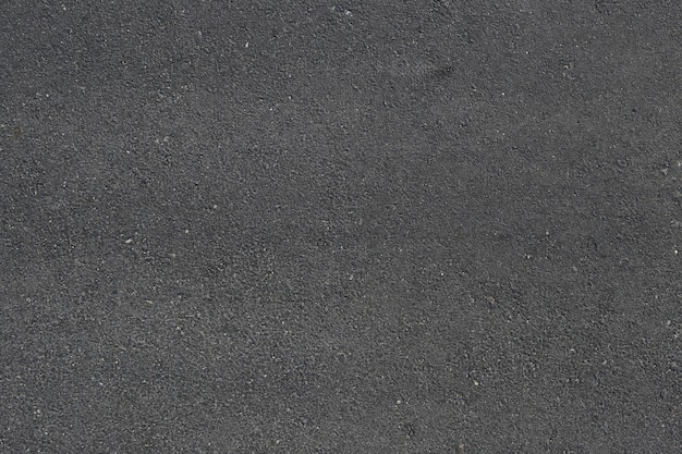 Zdjęcie powierzchnia drogi asfaltowej do projektowania tekstura tło w tobie działa.
